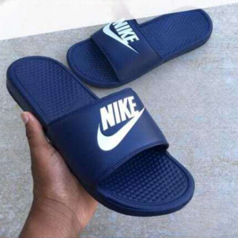 Navy blue nike flip flops best sale